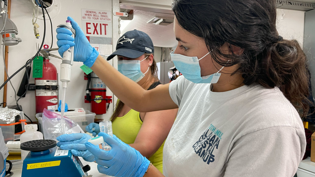 Katie and Penny running microbial samples. 